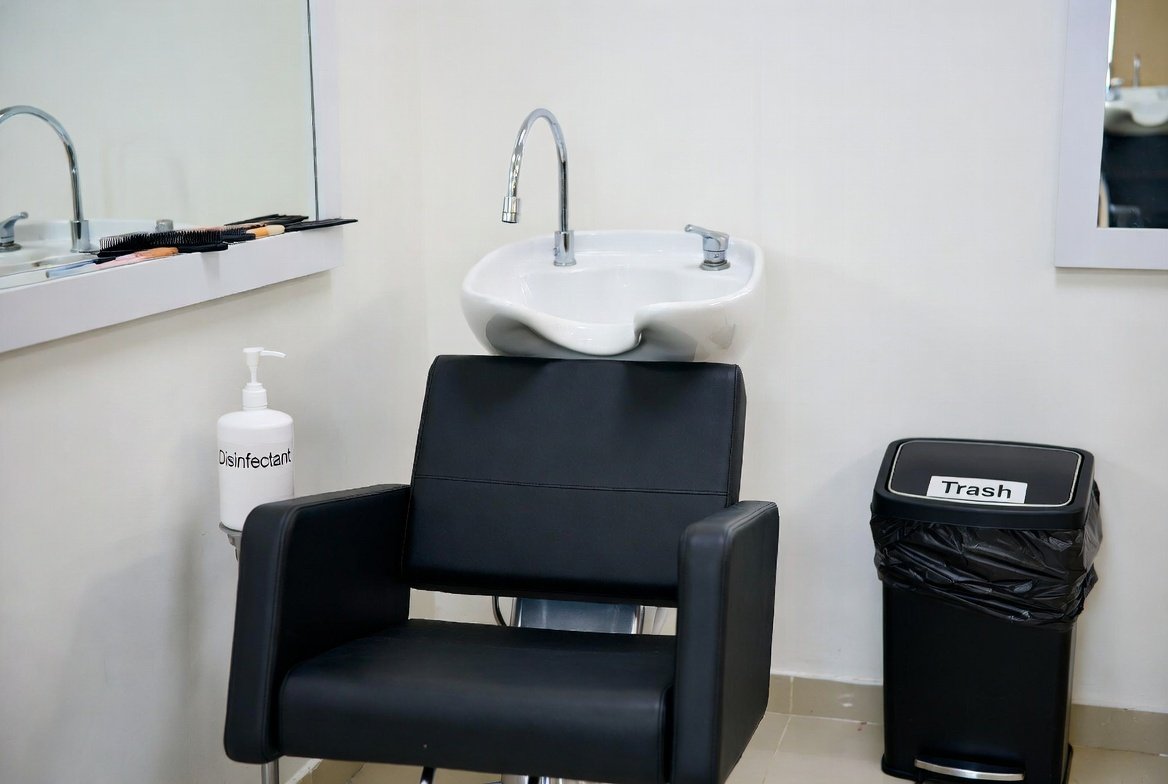 Well-organized salon workstation showing required TDLR equipment
